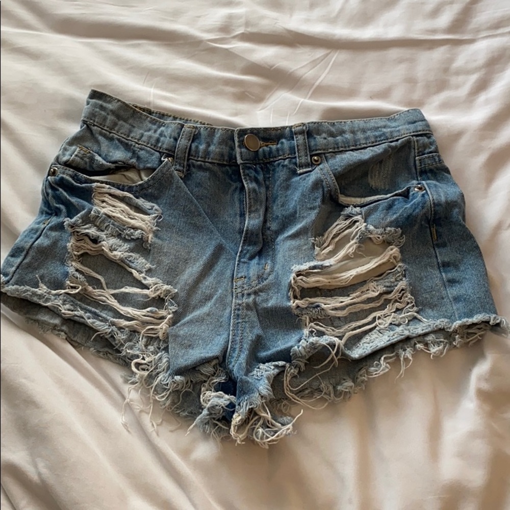Shredded high rise shorts